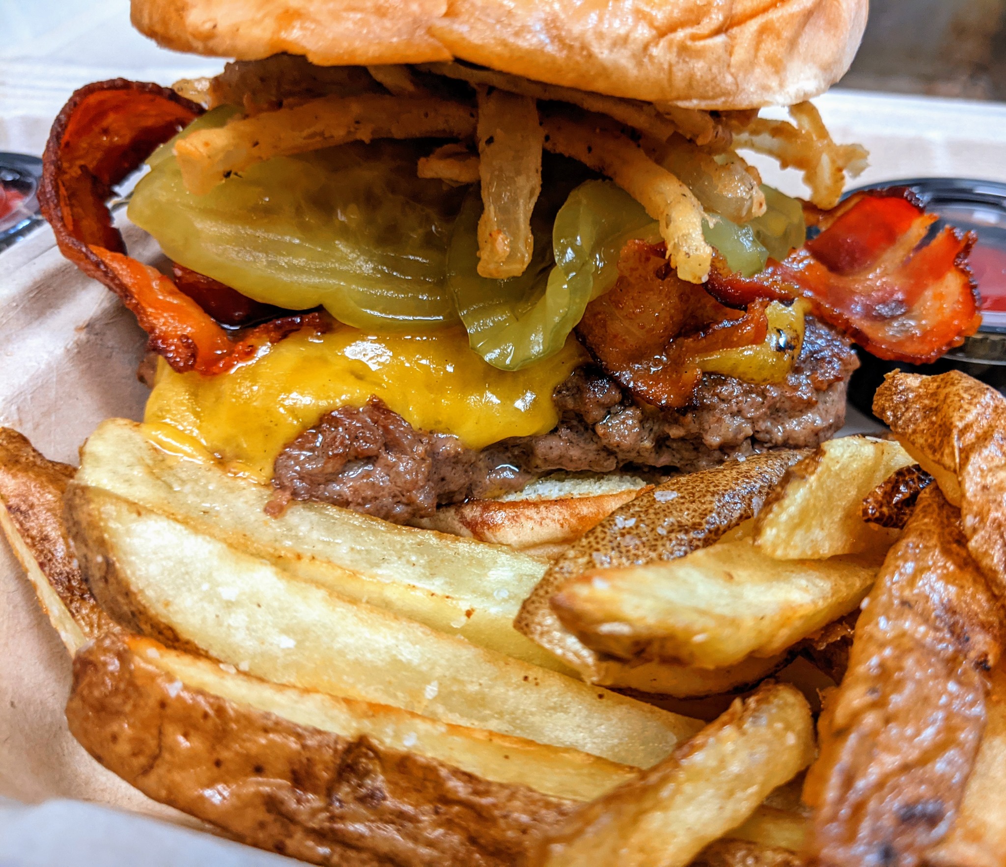 BBQ bacon cheeseburger and fries from Rock Hard Burgers & Brew — order direct, not via 'Online Ordering by DoorDash'